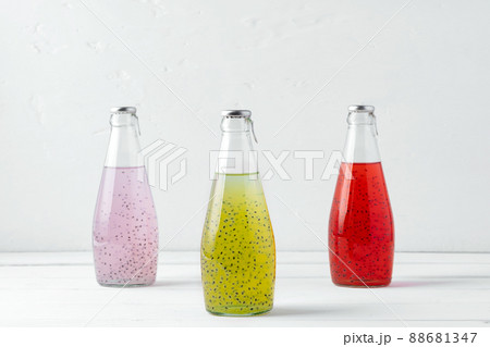 Basil seed drink in glass bottles on white background 88681347