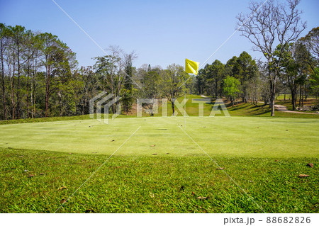 View of Golf Course with beautiful putting green. Golf course with a rich green turf beautiful scenery. View of Golf Course with beautiful putting green. Golf course with a rich green turf beautiful scenery. 88682826