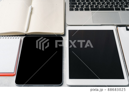 Office supplies and digital tablet on office table 88683025
