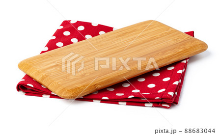 Wooden board and tablecloth isolated on white Wooden board and tablecloth isolated on white 88683044