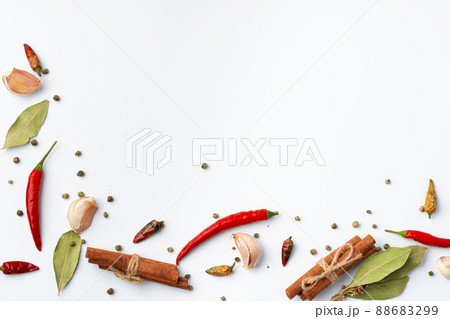 Variety of cooking spices on white background. Variety of cooking spices on white background. 88683299