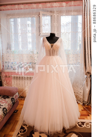 Wedding dress on a mannequin Wedding dress on a mannequin 88686329