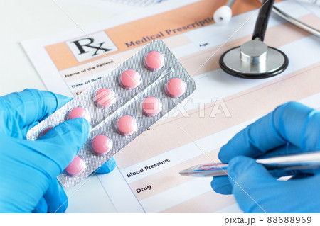 Medical prescription with doctor's sthetoscope and pills. 88688969