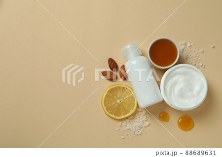 Natural spa cosmetics on beige background, top view Natural spa cosmetics on beige background, top view 88689631