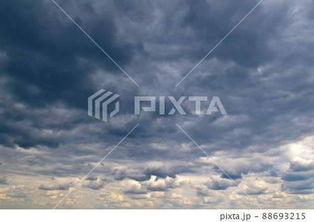 Black storm clouds and bright horizon Black storm clouds and bright horizon 88693215