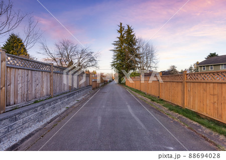 Alley in a residential neighborhood in the city suburbs. Surrey, Greater Vancouver Alley in a residential neighborhood in the city suburbs. Surrey, Greater Vancouver 88694028
