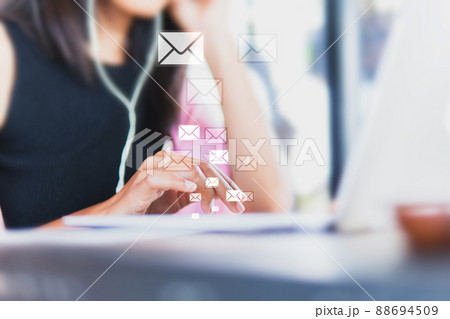 Business women are typing on laptops , communication technology, internet messaging, and icons 88694509