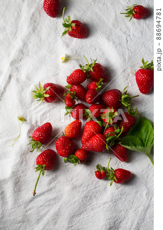 strawberries on a background of white rough fabric 88694781