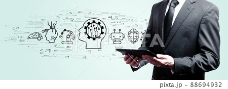 Future technology concept with businessman holding a tablet Future technology concept with businessman holding a tablet 88694932