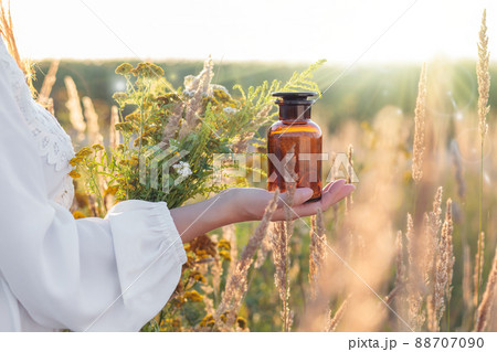 Drug bottle in hand, Concept image. 88707090