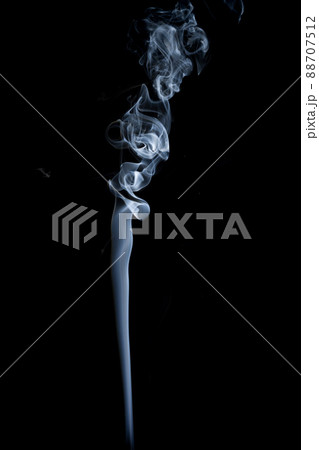 Close-up of steam white smoke on black backgrou. 88707512