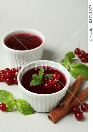 Cranberry sauce and ingredients on light gray background Cranberry sauce and ingredients on light gray background 88715977