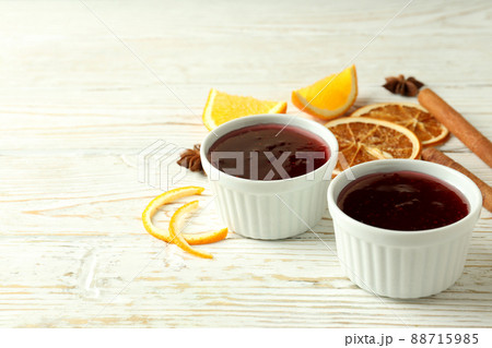 Cranberry sauce and ingredients on white wooden background Cranberry sauce and ingredients on white wooden background 88715985
