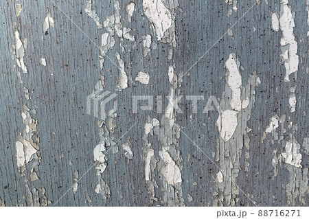 Texture of old dark grey wooden wall with cracking white paint Texture of old dark grey wooden wall with cracking white paint 88716271