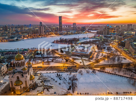 Winter Yekaterinburg and Temple on Blood in beautiful pink and orange sunset. Translation of the text on the temple Winter Yekaterinburg and Temple on Blood in beautiful pink and orange sunset. Translation of the text on the temple 88717498