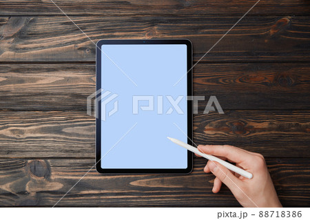 man using a Tablet pc. close up. man using a Tablet pc. close up. 88718386