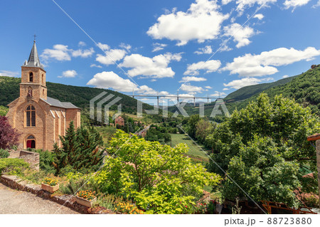 Full of green trees and plants in bloom Tarn valley, Church of St. Christopher 88723880