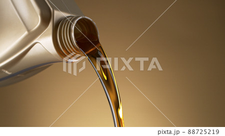 Pouring Oil from Plastic Container Pouring Oil from Plastic Container 88725219