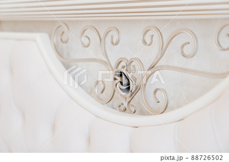 forged metal patterns on the soft headboard. forged metal patterns on the soft headboard. 88726502