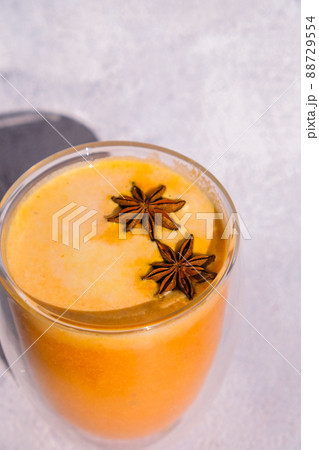 Pumpkin smoothie spiced latte. Anise stars. Autumn coffee with spicy pumpkin flavor seasonal hot drink. Fall Drinks for Halloween and Thanksgiving Pumpkin smoothie spiced latte. Anise stars. Autumn coffee with spicy pumpkin flavor seasonal hot drink. Fall Drinks for Halloween and Thanksgiving 88729554