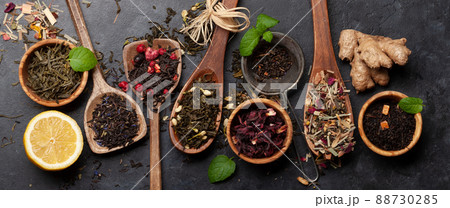 Various dried tea in wooden spoons Various dried tea in wooden spoons 88730285