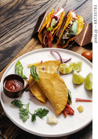Tacos with meat and vegetables Tacos with meat and vegetables 88730783