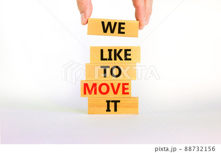 We like to move it symbol. Concept words We like to move it on wooden blocks. Businessman hand. Beautiful white table white background. Business motivational We like to move it concept. Copy space. We like to move it symbol. Concept words We like to move it on wooden blocks. Businessman hand. Beautiful white table white background. Business motivational We like to move it concept. Copy space. 88732156