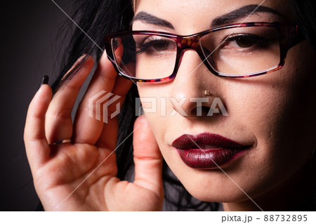 Young girl isolated on colorful background in bikini, photo for the summer advertisement banner and body care. Young girl isolated on colorful background in bikini, photo for the summer advertisement banner and body care. 88732895