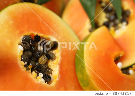 Fresh papaya all over background, close up Fresh papaya all over background, close up 88743817