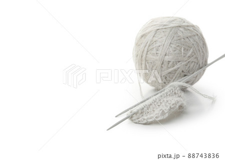 Ball of yarn with knitting needles isolated on white background Ball of yarn with knitting needles isolated on white background 88743836