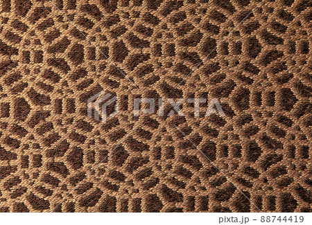 Abstract circular print background on cotton fabric in golden brown tone Abstract circular print background on cotton fabric in golden brown tone 88744419
