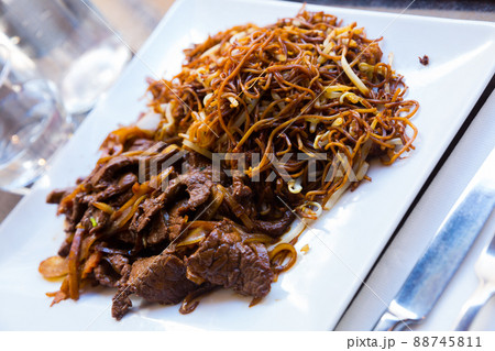 Beef with onions and noodles Beef with onions and noodles 88745811