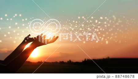 Businessman hold circular economy icon. Sustainable strategy approach to eliminate waste and pollution for future growth of business and environment, design to reuse and renewable material resources. Businessman hold circular economy icon. Sustainable strategy approach to eliminate waste and pollution for future growth of business and environment, design to reuse and renewable material resources. 88748678