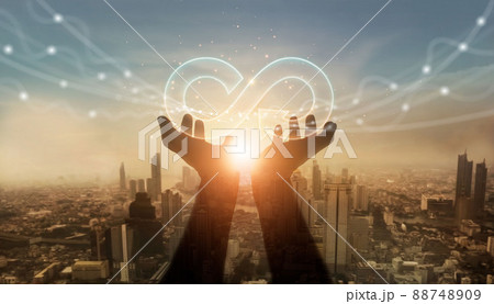 Businessman hold circular economy icon. Sustainable strategy approach to eliminate waste and pollution for future growth of business and environment, design to reuse and renewable material resources. 88748909
