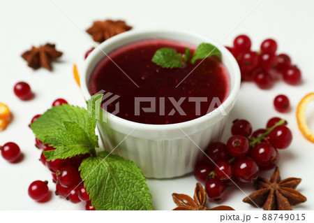 Cranberry sauce and ingredients on white background Cranberry sauce and ingredients on white background 88749015