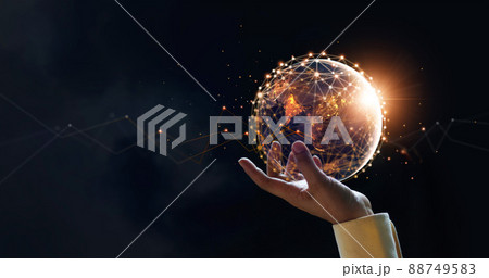.Businessman holding night earth and global networking connection and data exchanges, global communication network concept, Elements of this image furnished by NASA. 88749583