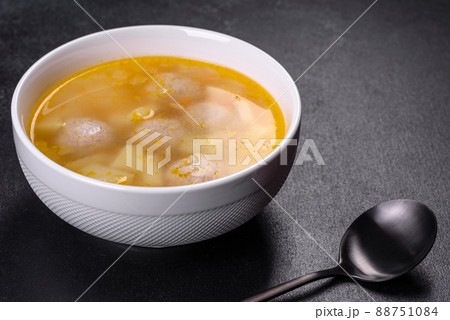 Soup with turkey meatballs, potatoes and vegetables. Selective focus 88751084