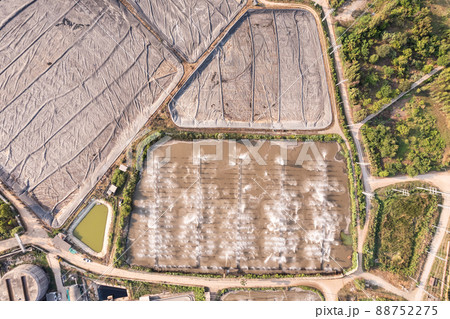 Large wastewater treatment pond and plastic covered fermentation biomass pond in renewable energy bioethanol plant 88752275