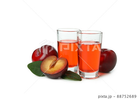 Plum brandy shots isolated on white background Plum brandy shots isolated on white background 88752689
