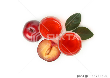 Plum brandy shots isolated on white background Plum brandy shots isolated on white background 88752690