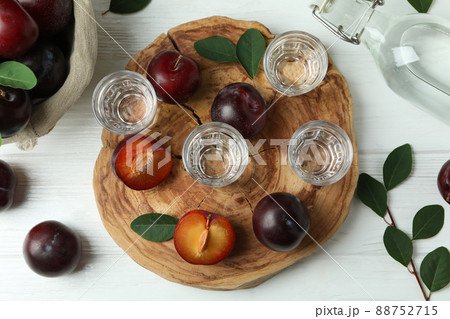 Concept of alcohol with plum vodka, top view 88752715