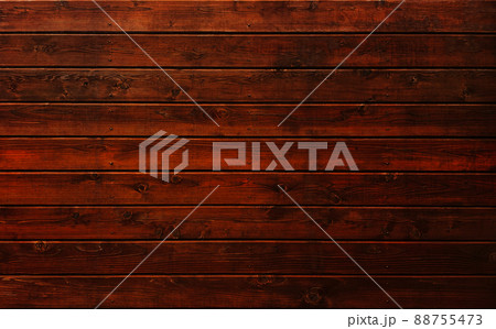 丸頭の真鍮釘で木目と節のある赤みを帯びた茶褐色の板を板張りした背景画像 丸頭の真鍮釘で木目と節のある赤みを帯びた茶褐色の板を板張りした背景画像 88755473