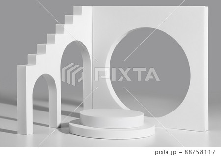Empty podium and geometrical figures with steps, arched and round openings on gray Empty podium and geometrical figures with steps, arched and round openings on gray 88758117