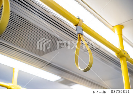 Close up the rubber - plastic cable hand holding in ariport rail link train. Close up the rubber - plastic cable hand holding in ariport rail link train. 88759811