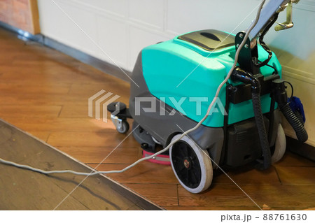 cleaning machine working on the floor. 88761630
