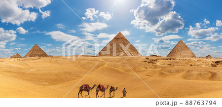 Panorama of Giza with the Pyramids, camels and a bedouin Panorama of Giza with the Pyramids, camels and a bedouin 88763794