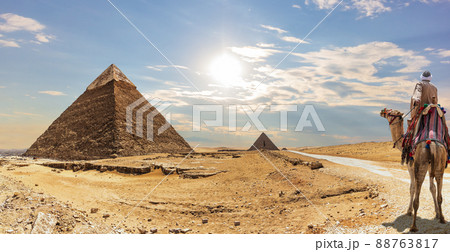 The Pyramid of Khafre and a bedouin on a camel, Giza, Egypt 88763817