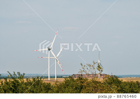 Wind turbines in an arid landscape. An alternative way of generating electricity Wind turbines in an arid landscape. An alternative way of generating electricity 88765460
