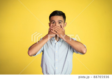 man cover his nose and feeling disgusted by the smell man cover his nose and feeling disgusted by the smell 88765936
