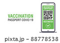 Covid-19 immune passport app. International Digital vaccine certificate for free movement and travel. Smartphone with Qr code test result in hand 88778538